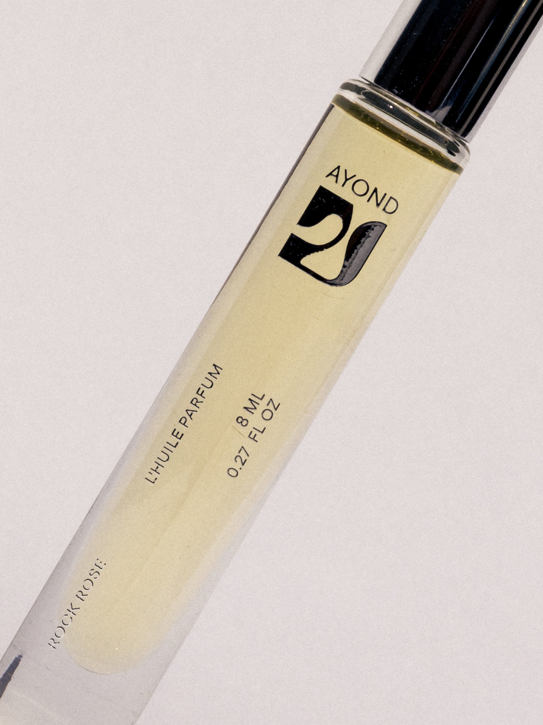 Rock Rose Perfume Oil rollerball on a white background